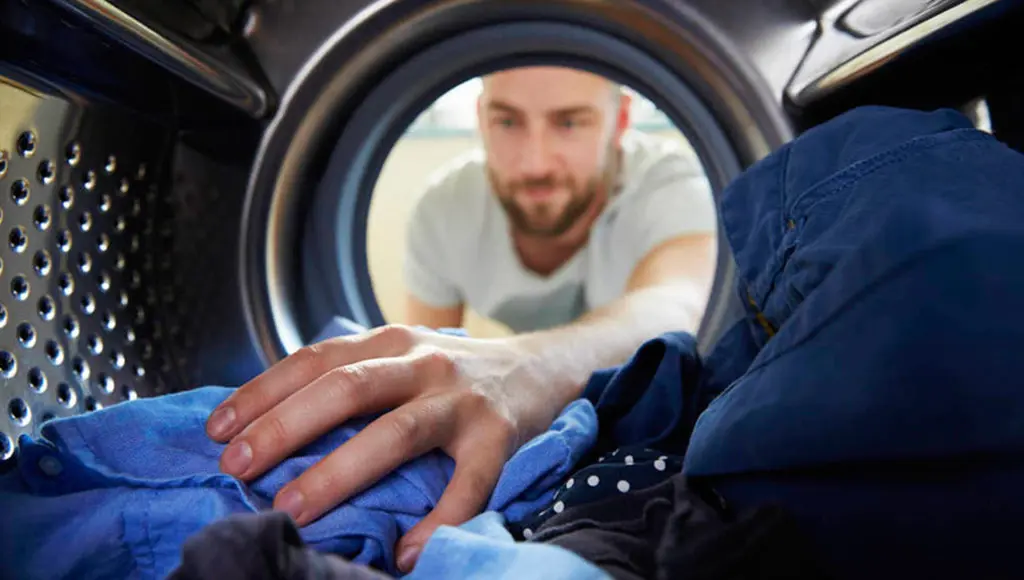 como sacar grasa de auto de la ropa - Cómo lavar la ropa de un mecánico