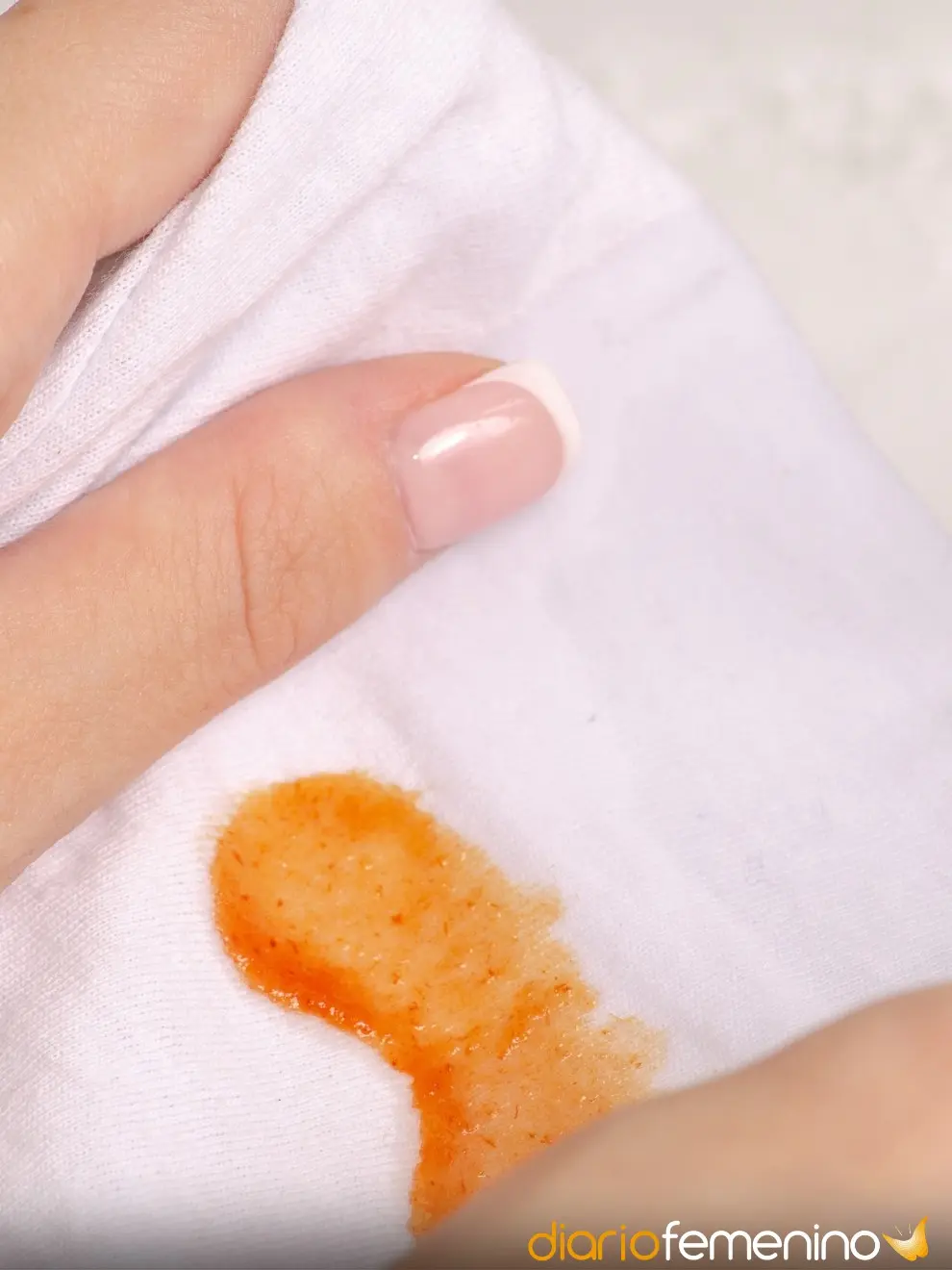 como quitar manchas de naranja en ropa blanca - Cómo sacar las manchas naranjas de la ropa